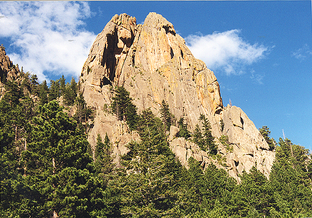 The Twin Owls formation. The Organ Pipes route ascends the wavy
wall near the right ridge, and stops at the Rooster Ledge midway up.