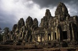 crw_6426 The many faces of the Bayon illuminated through a break in the clouds.