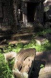 crw_6710 Unrestored ruins with an apsara in the background in Ta Prohm.