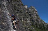 crw_5753 Chris heading up the crack with the granite walls of Yosemite valley in the background.