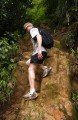 dominica2005-boilinglake-21 John slipping down a steep section of the trail.